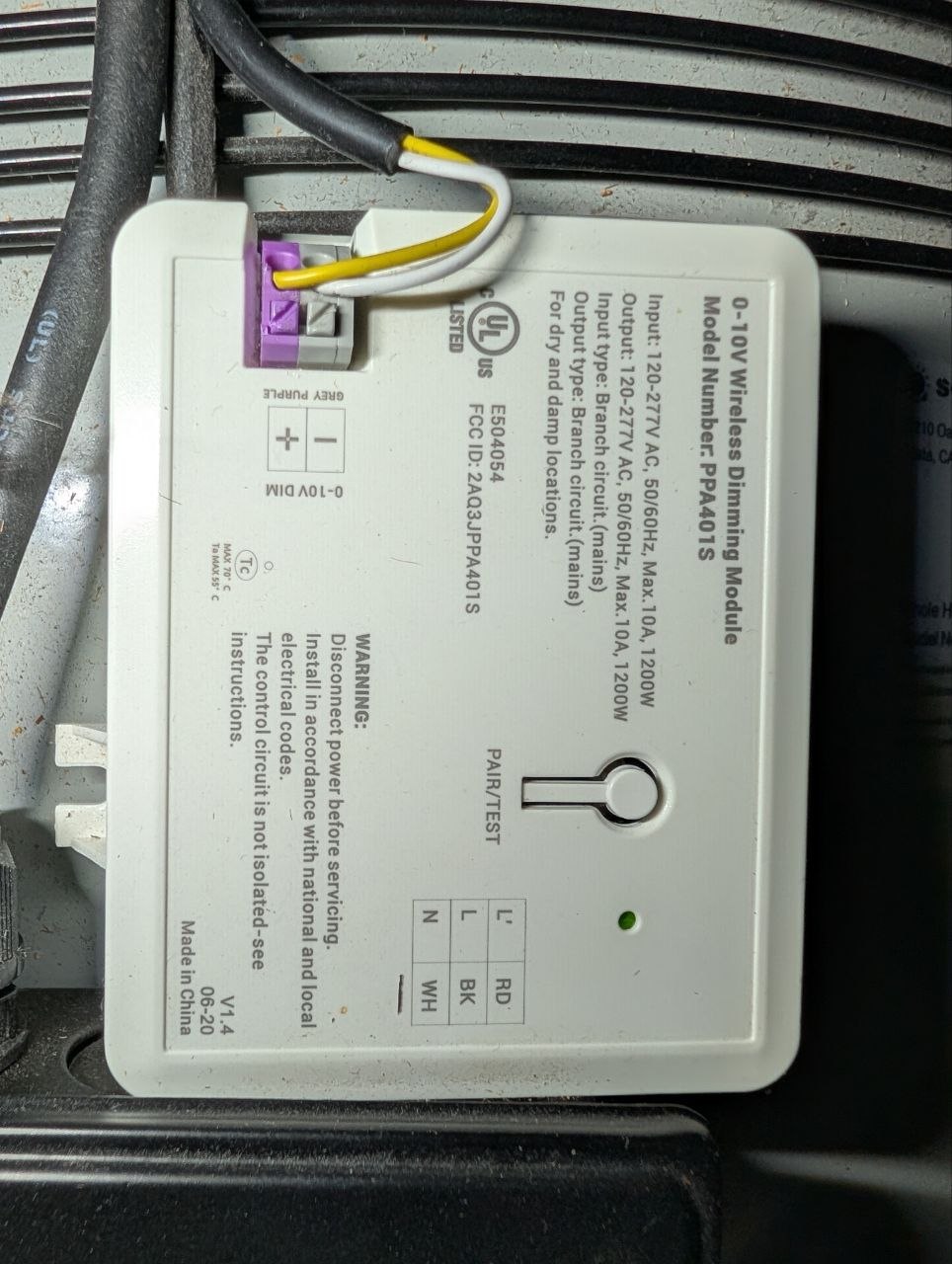 Close-up of the 0-10V Wireless Dimming Module — model PPA401S, full specs visible